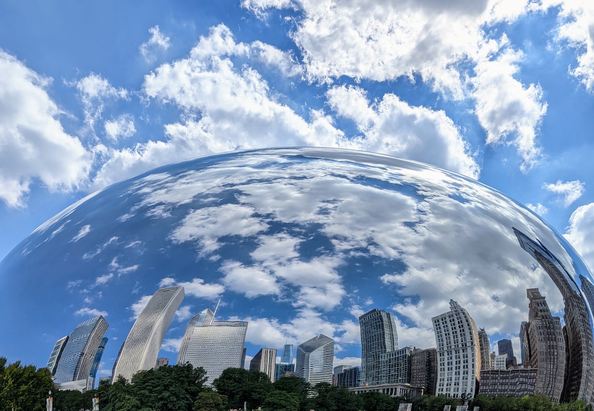 The skyline of downtown Chicago reflected in the iconic sculpture "Cloudgate," better known by locals and tourists as "the Bean." Appropriately, clouds are swirling over the skyscrapers and the sculpture. To me, Cloudgate often looks like a crystal ball and symbolizes a future of innovation and creativity.